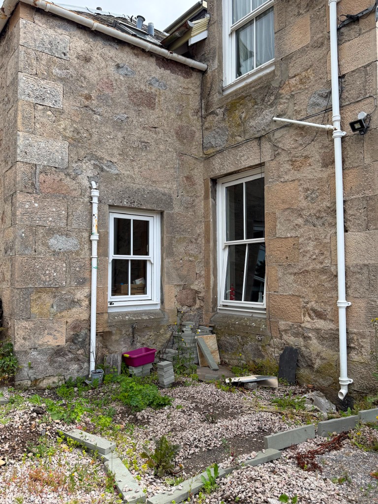 The plot — stone building